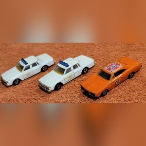 ERTL Dukes of Hazzard General Lee and 2 Hazzard Bonneville Police cares